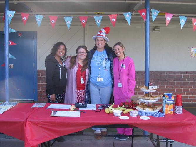 YFRC Staff all dressed up for Read Across America Day, in celebration of Dr. Seuss' Birthday!